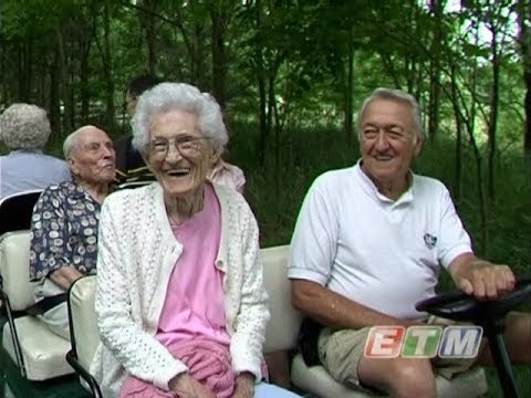 Limited Mobility People Enjoy Outdoors on South Huron Trail Mobile